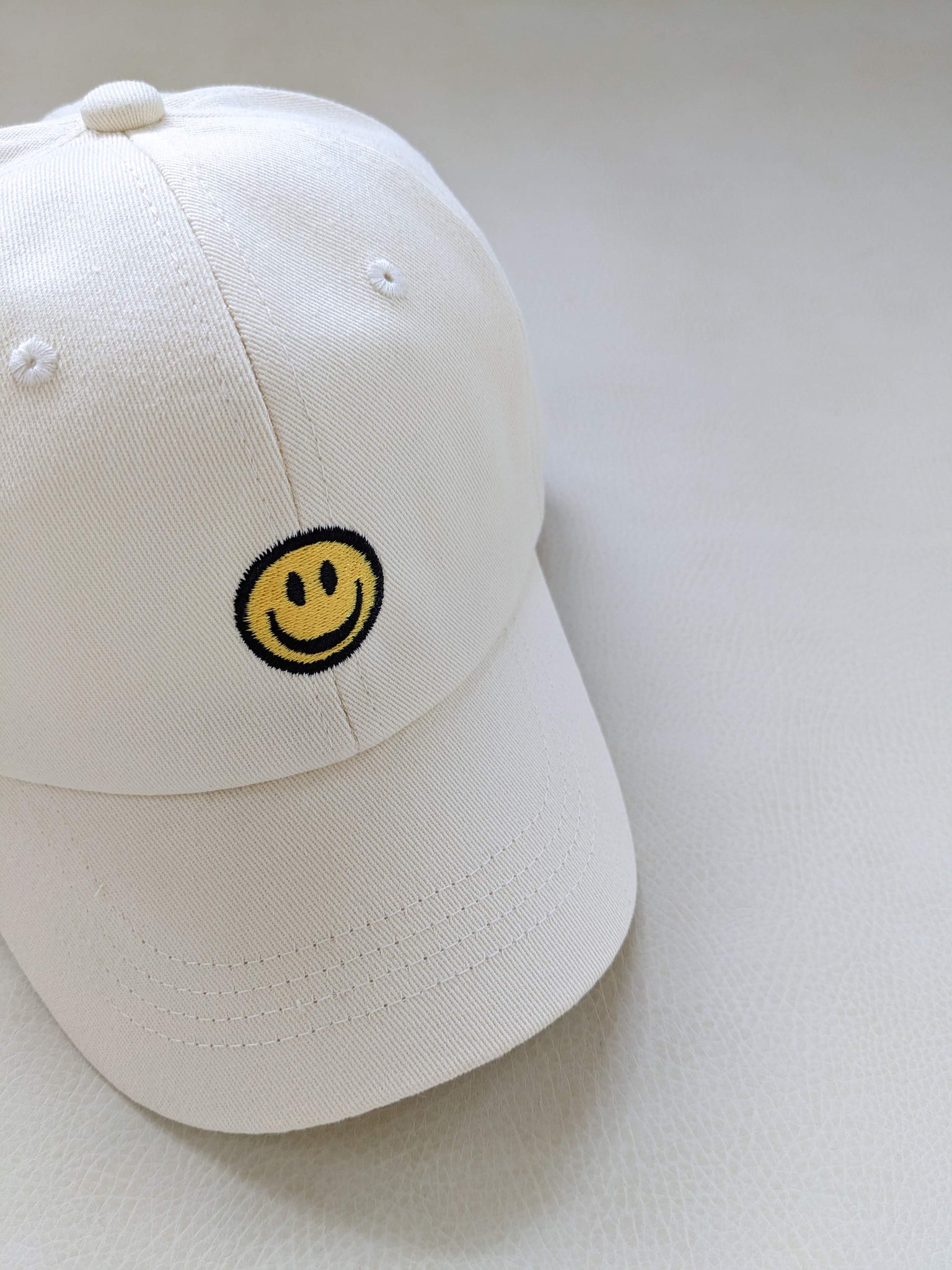 Nike smile hat top