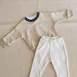Hansel Logo Neck Jumper - Almond